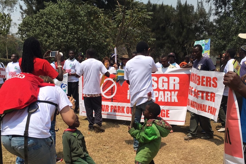 People gather with signs and placards in Nairobi