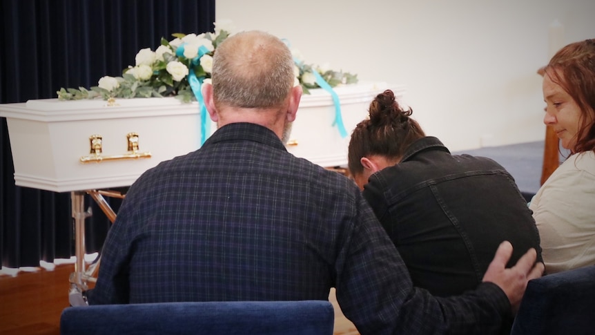 Shyanne-Lee Tatnell's mother cries at her daughter's funeral.