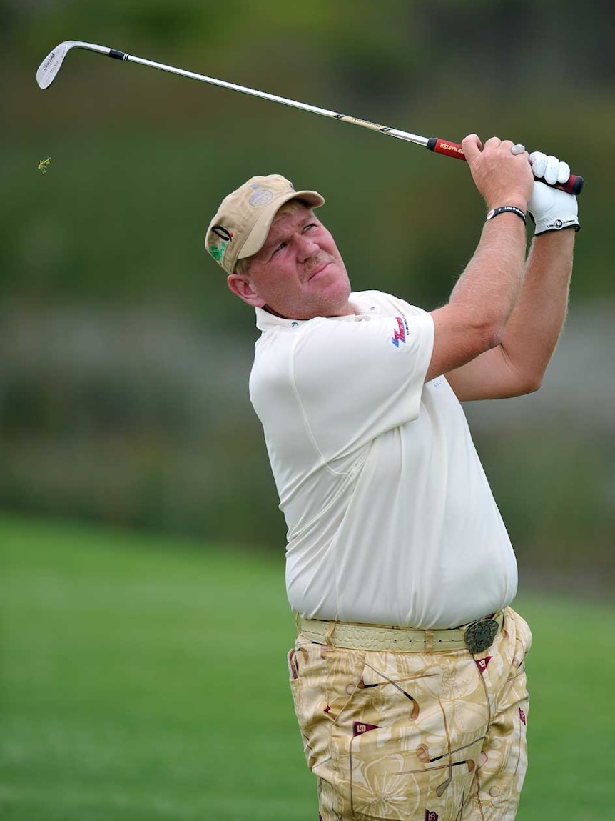 Daly plays a shot at the Australian Open