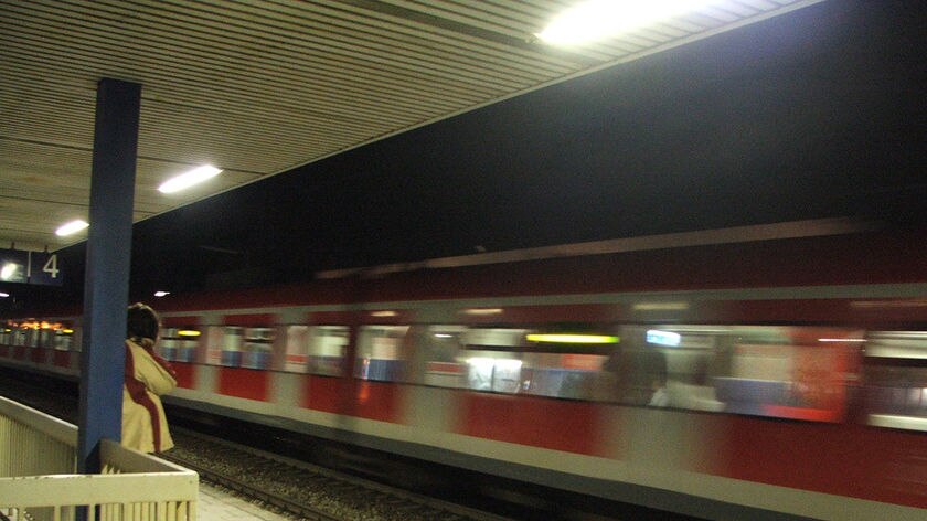 Train rushes past station