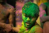 A swarm of bees attack a man with green coloured hair and yellow face in crowd