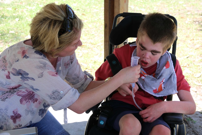 Vanita Connery feeding her son Jordan