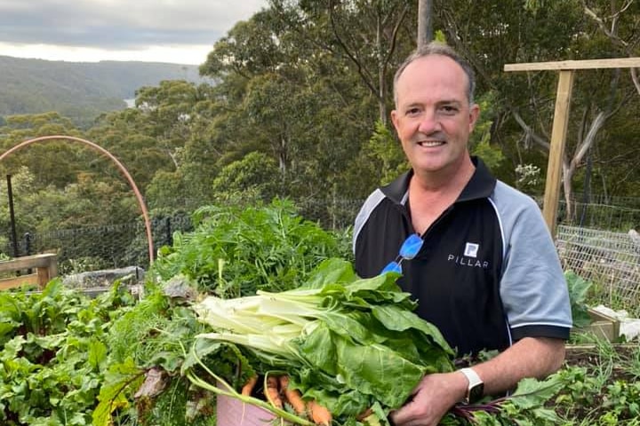 Man in vegetable garden