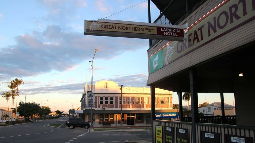 A streetscape of some hotels in a small town