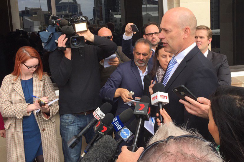 Dean Nalder talks to reporters.