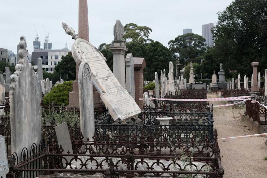 Damaged gravestones at a cemetery