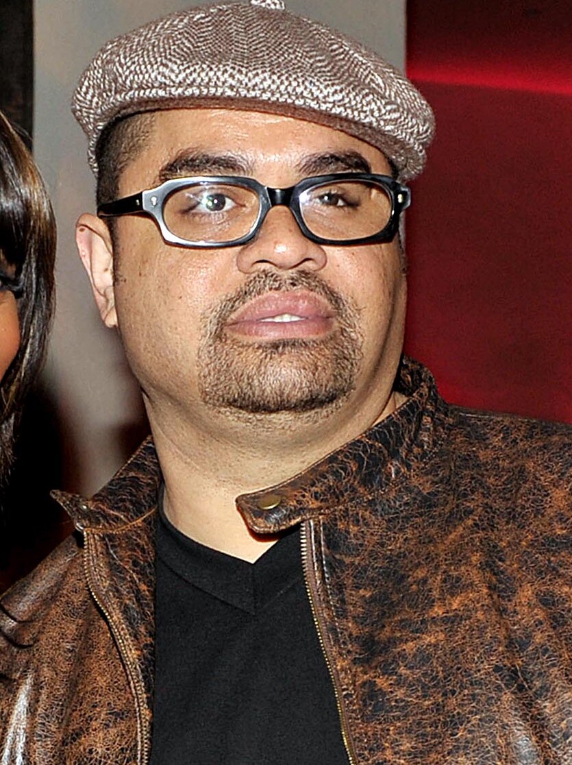 Heavy D poses for photos at an afterparty.