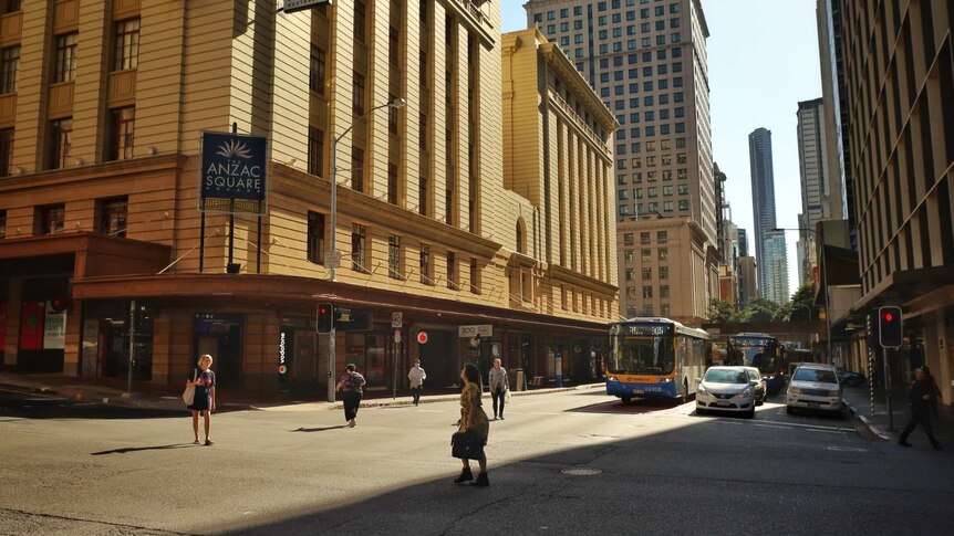 A quiet scramble crossing in Adelaide and Edward Streets in Brisbane on April 1, 2020.