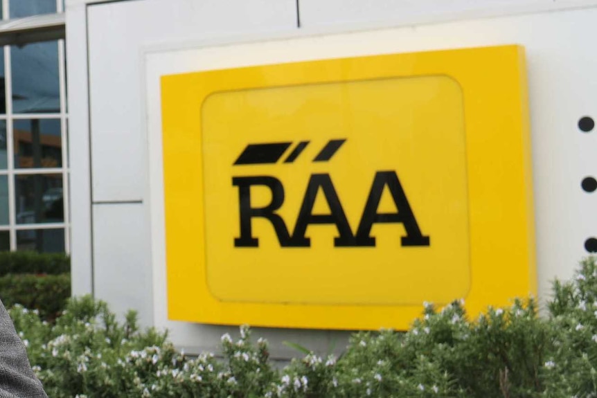 A square, yellow logo with the letters RAA