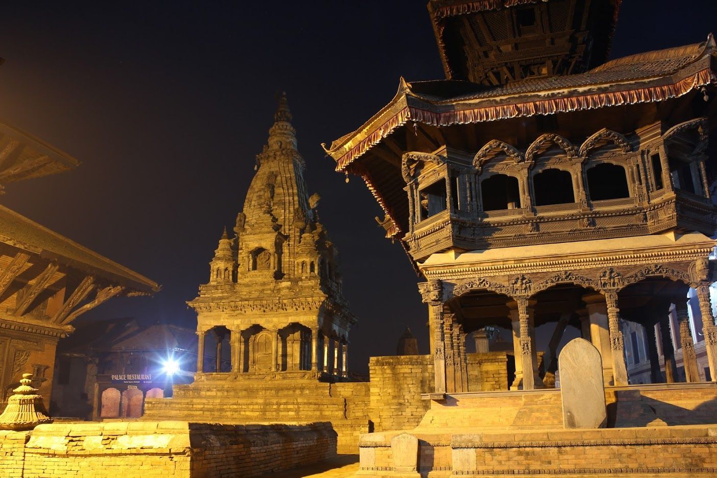 Two temples are photographed at night