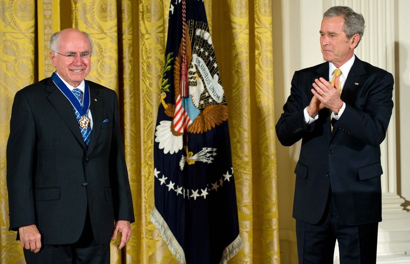 George W Bush applauds John Howard