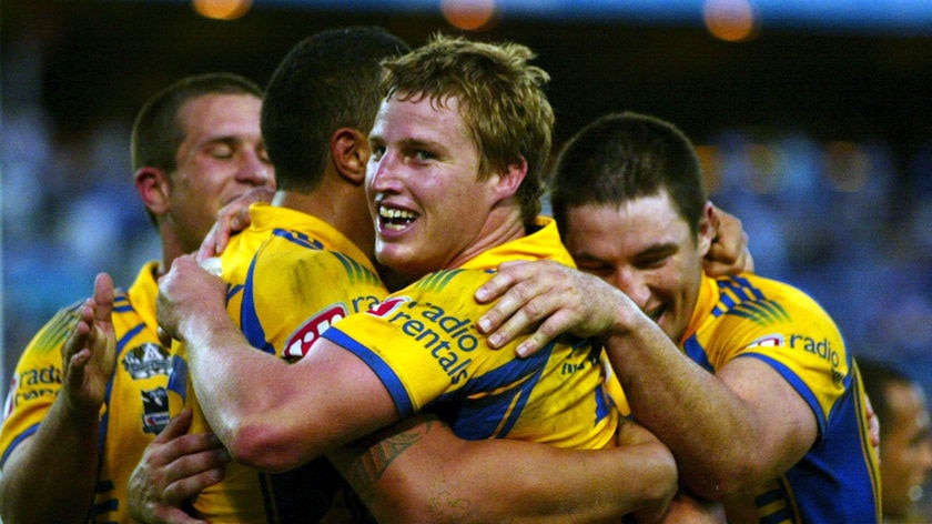 Brett Finch congratulates Parramatta try scorer Feleti Mateo