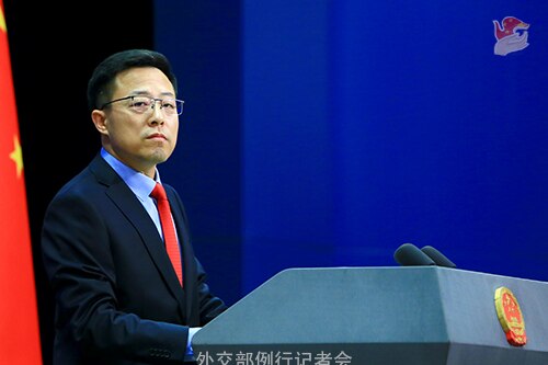Chinese Ministry of Foreign Affairs spokesman Zhao Lijian stands at a lectern