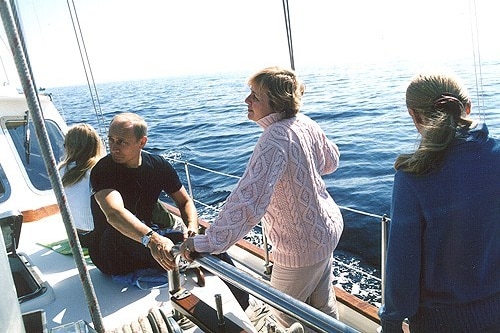 Vladimir Putin on a sail boat with a woman and two teen girls 