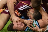 Qld player Brent Tate hits NSW player Greg Bird during State of Origin III