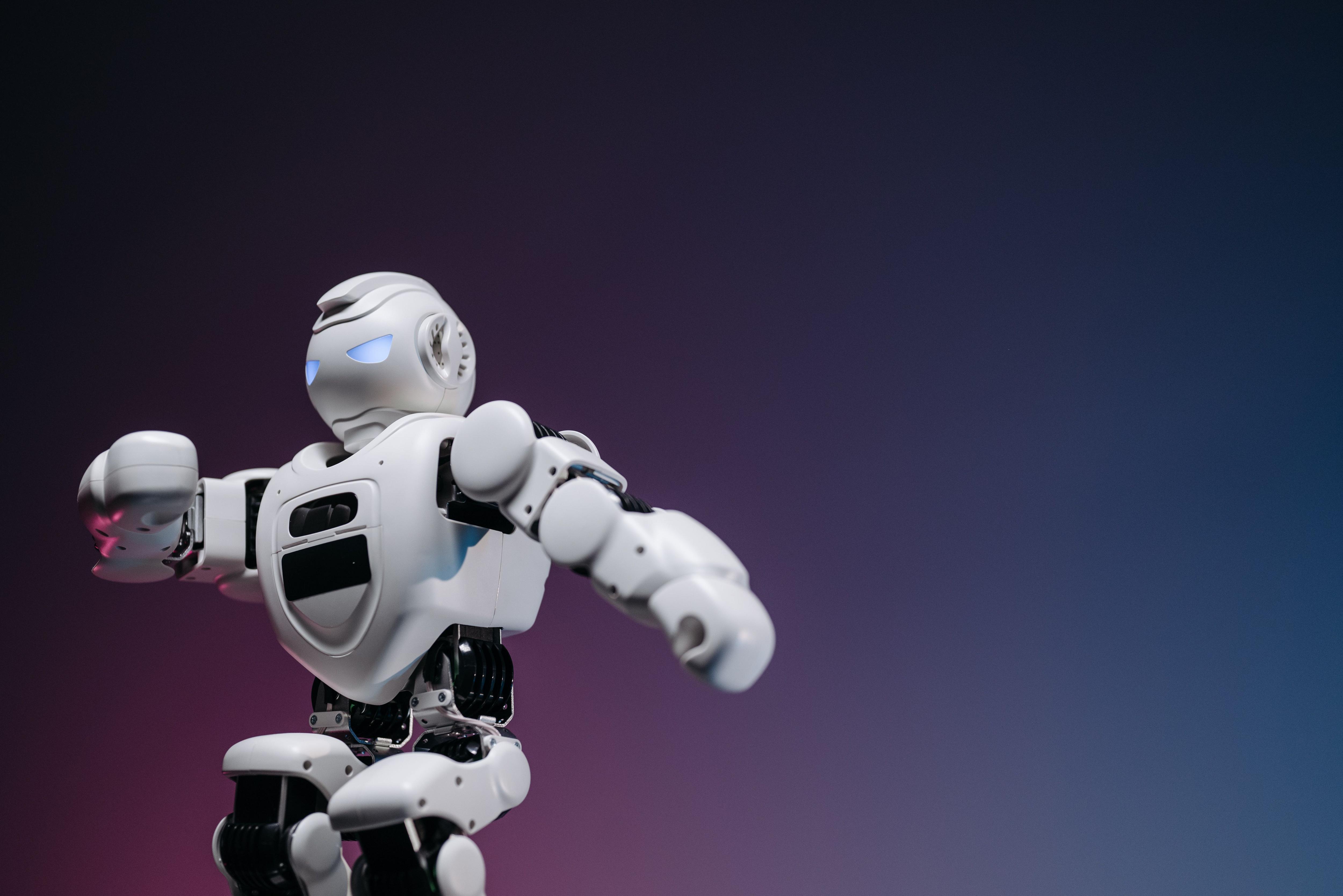Close-up of a futuristic robotic toy against a gradient background, symbolizing innovation and technology