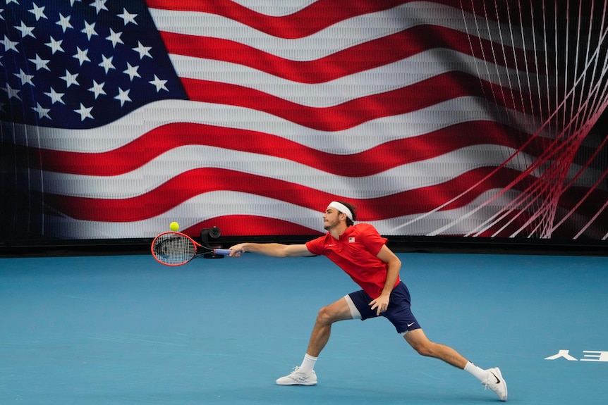 United States' Taylor Fritz plays a forehand.