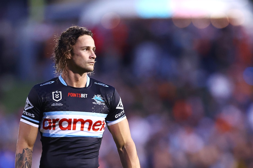 Nicho Hynes of the Cronulla Sharks stands on the field before an NRL game.
