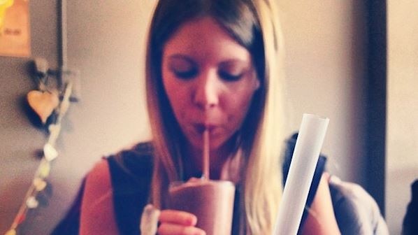 Jessica drinking a chocolate and kale smoothie in June 2014.