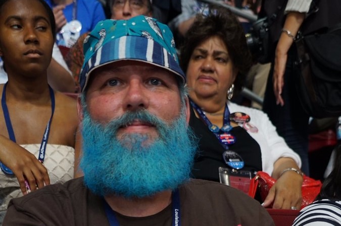 Ryan Trudle has his beard dyed blue at the Democratic Convention.