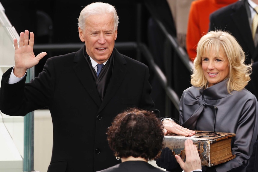 Joe Biden takes the oath of office.