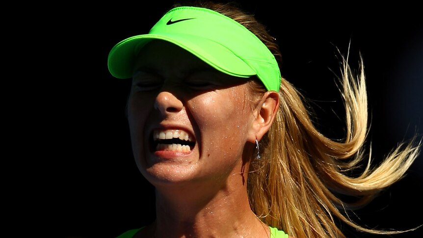 Gritty win ... Maria Sharapova celebrates winning a point against Petra Kvitova (Clive Brunskill/Getty Images)