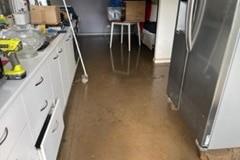 Flood water in a kitchen area of a house. 