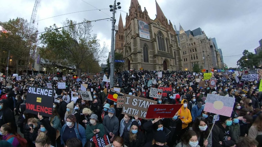 Black Lives Matter protesters gather at Flinders Street Station in Melbourne