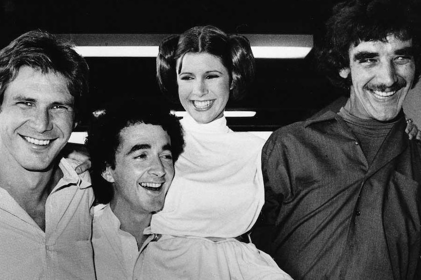 Peter Mayhew (far right) with Harrison Ford, Anthony Daniels, Carrie Fisher in 1978.