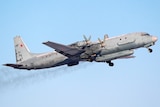 A Russian Air Force plane is flying in the sky.