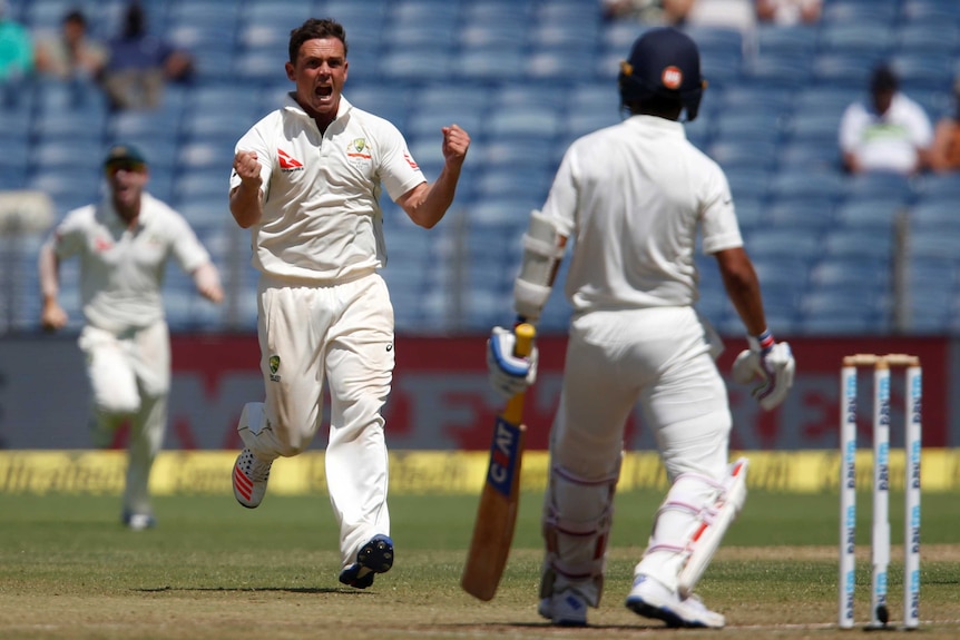 Steve O'Keefe celebrates a wicket in Pune