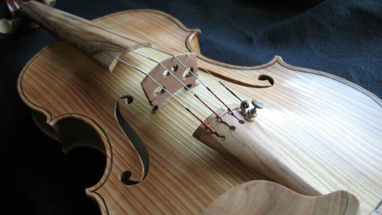 A close up picture of a new violin