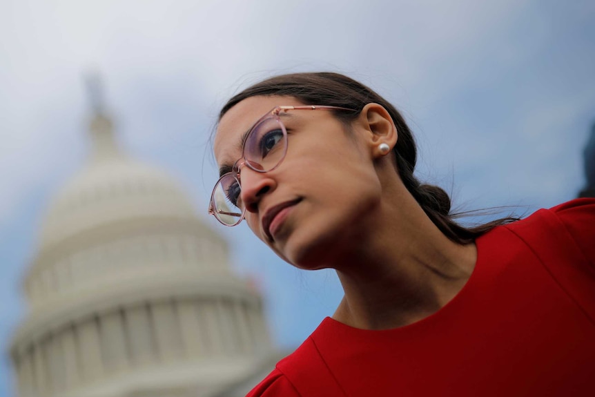 Democratic Representative-elect Alexandria Ocasio-Cortez pictured in from of the Capitol buildiling