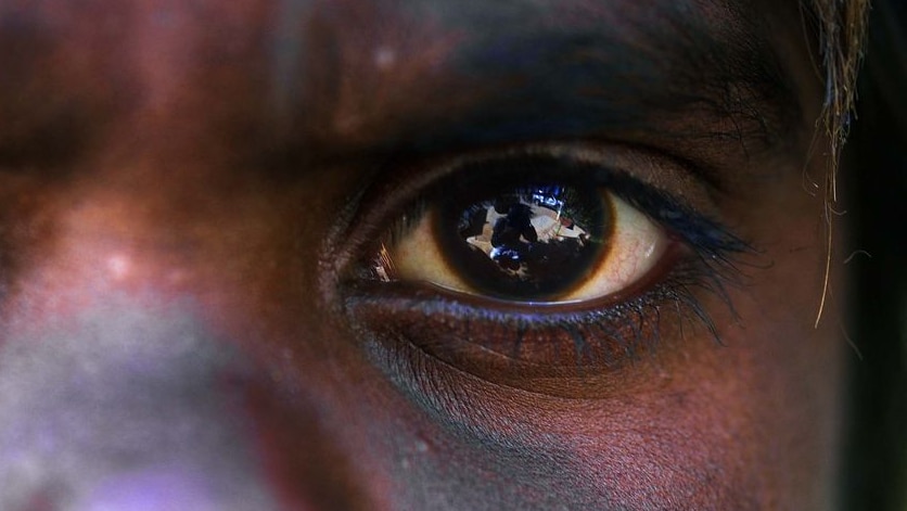 An Aboriginal boy poses for a photo [AAP: Dave Hunt]