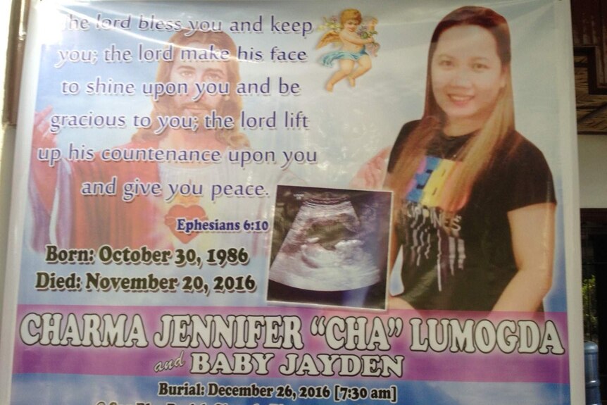 A large banner showing a Biblical verse and a photo of the victim and an ultrasound.