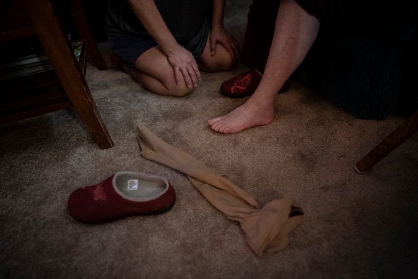 Susan Ryder's hands pictured next to a stocking after struggling with her mother.