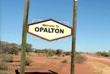 A sign reads "Welcome to Opalton" in central west Queensland.