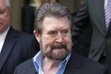 Derryn Hinch leaves the Melbourne Supreme Court