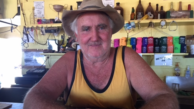 Publican Lester Cain sitting behind the bar at the Middleton Pub.