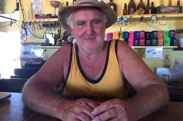 Publican Lester Cain sitting behind the bar at the Middleton Pub.