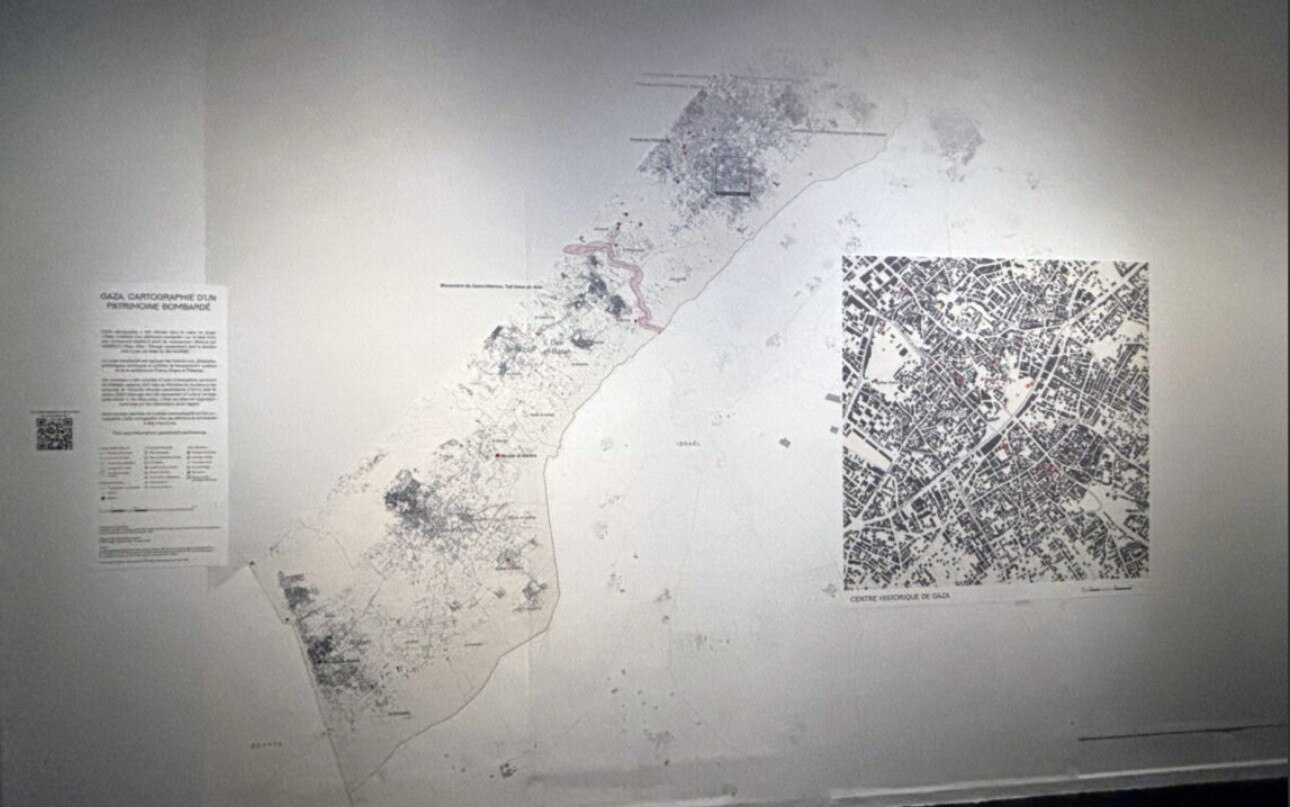 Two photographs of maps show views from a Mosque.