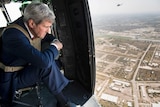 john Kerry arrives in Baghdad