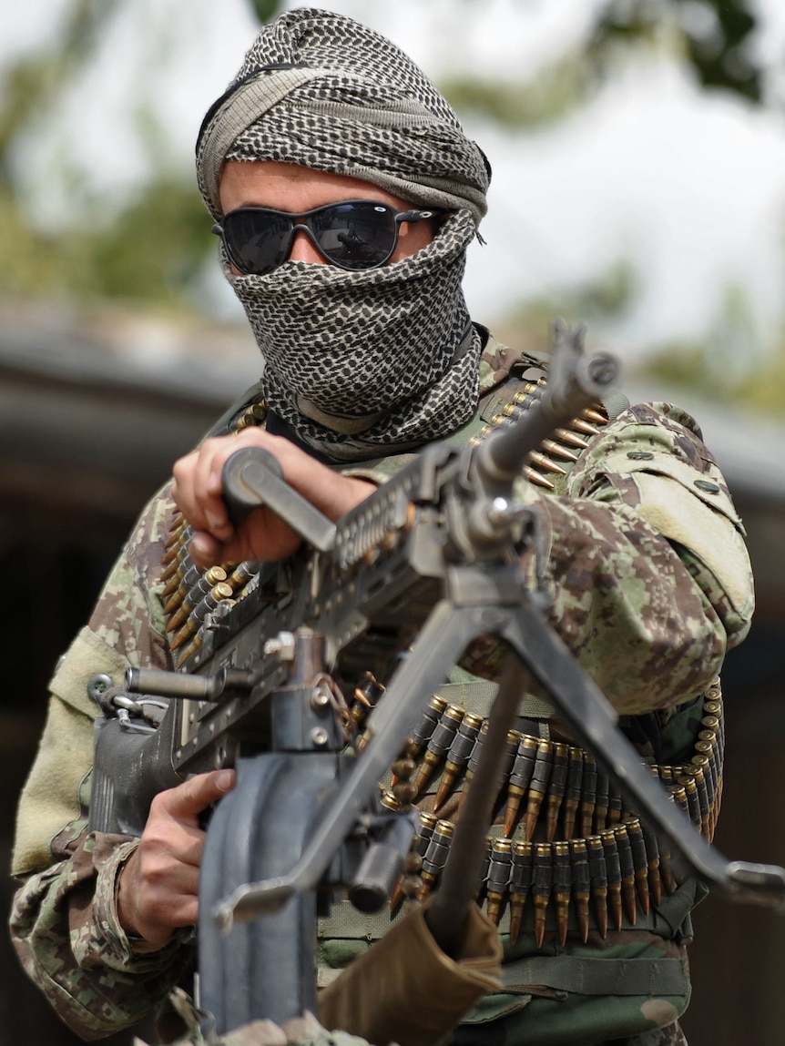 Afghan National Army soldier with machine gun