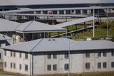 Prison buildings and walkways at a correctional facility.