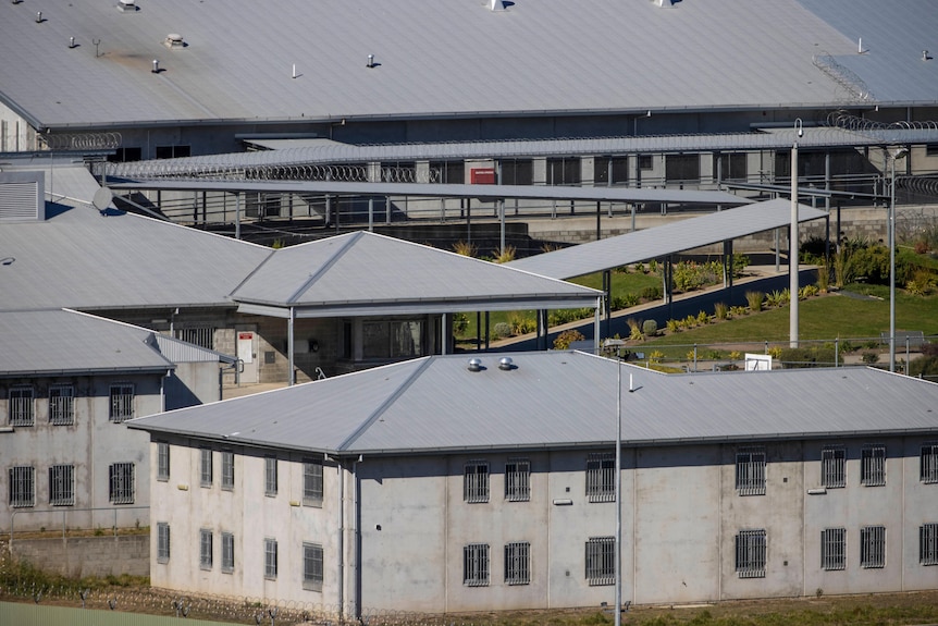 Prison buildings and walkways at a correctional facility.