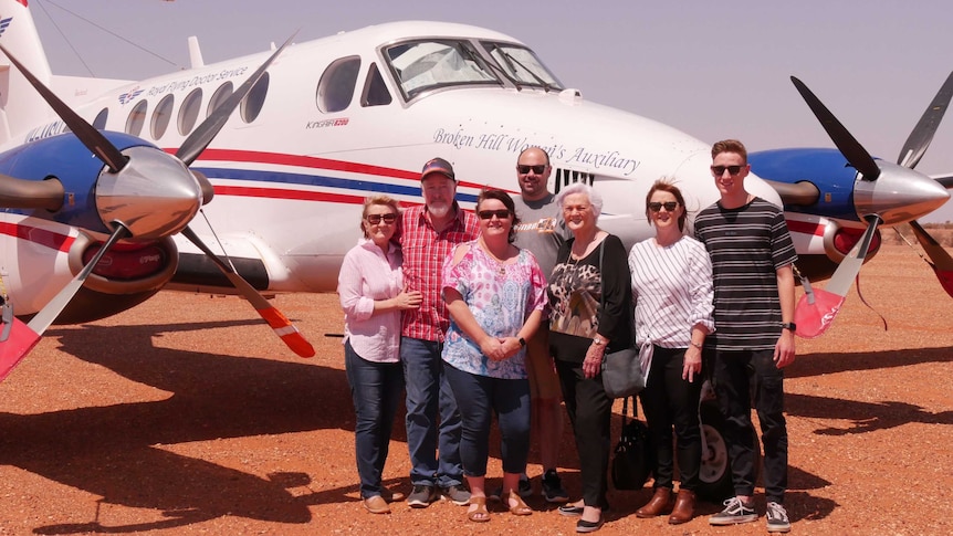 RFDS plane and members of the Bates, Barlow and Colley families at the Packsaddle landing strip