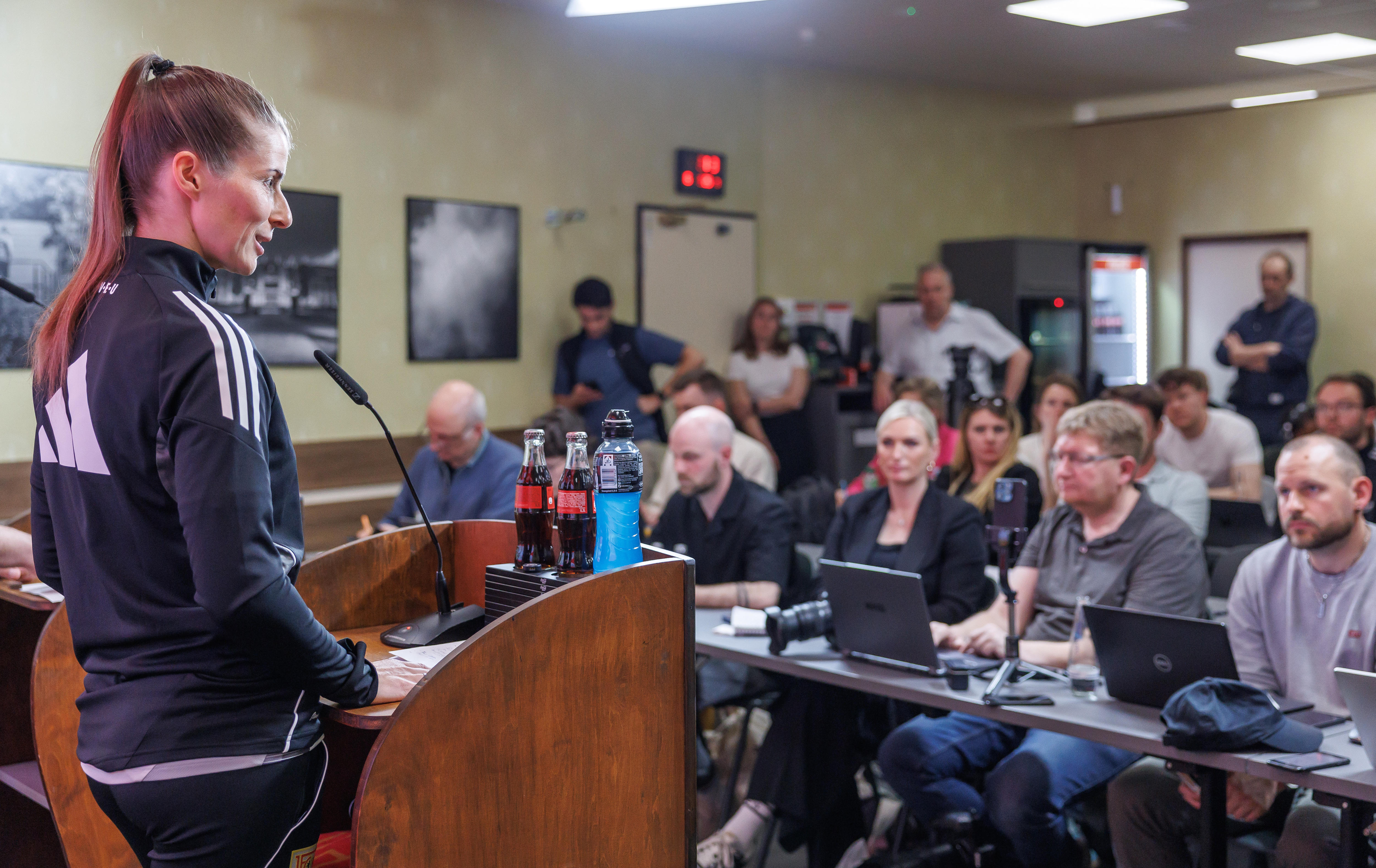 Marie Louise Eta talks at a press conference