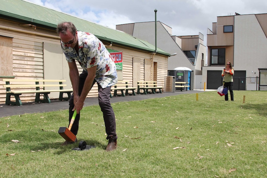 Stuart Lucca-Pope prepares to hit a Trugo ring into the goal area at the Footscray Trugo Club.