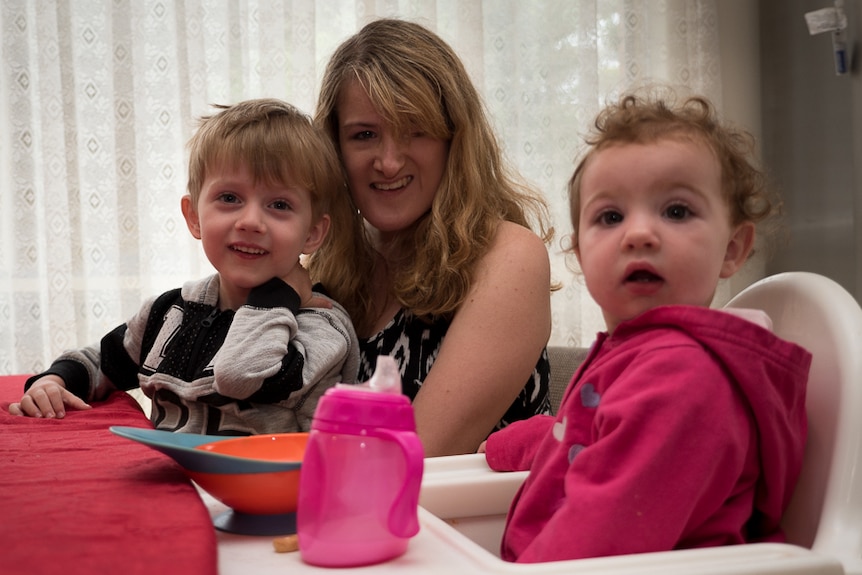 Ellen (C) baby sits her godchildren Zaiden (L) and Azaila-Lee (R).
