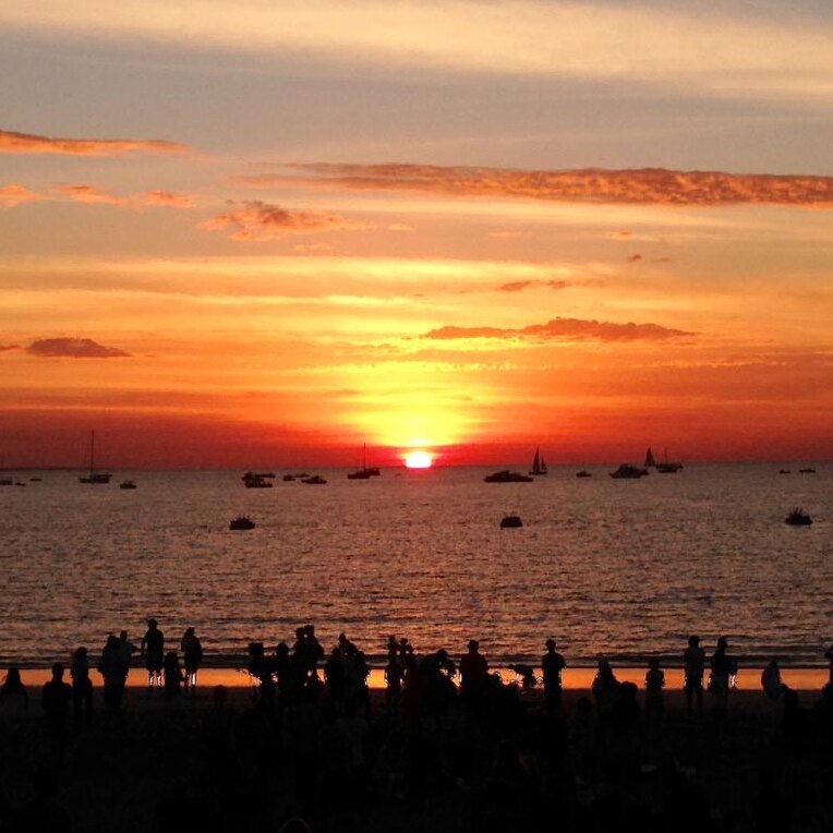 Beachgoers enjoyed a golden sunset at Mindil Beach ahead of Territory Day events.